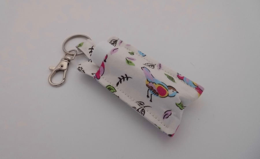Key ring lip balm holder in bird print fabric keyring
