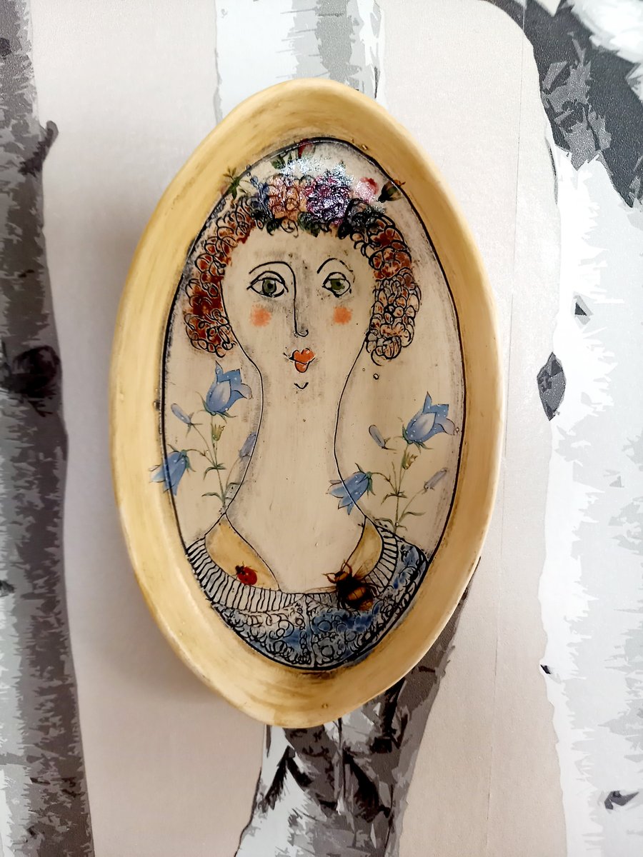 Figurative wall hanging .