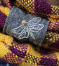 Hand woven unisex check cowl in yellow and purple with an embroidered dragonfly - Image 4