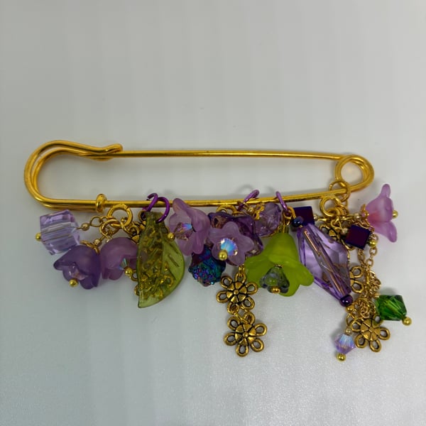 Lilac and green kilt pin brooch