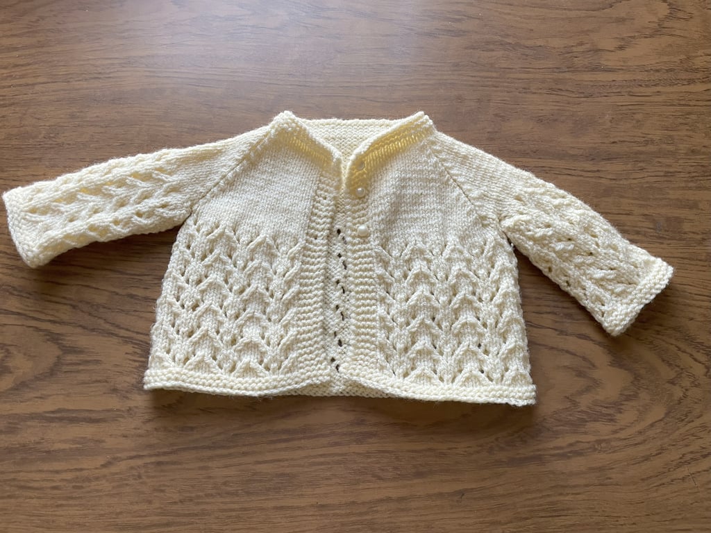 Handmade baby girl's cardigan for ages 3-6 months