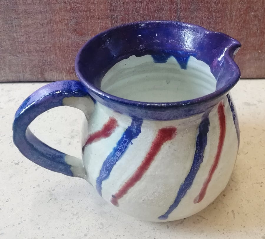 Stripey delectable ceramic jugs