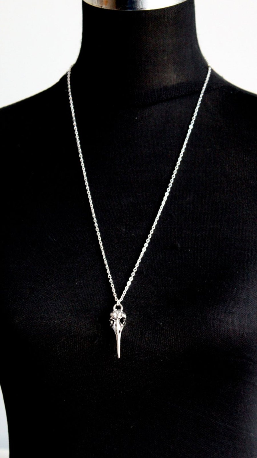 Long skeleton dagger necklace