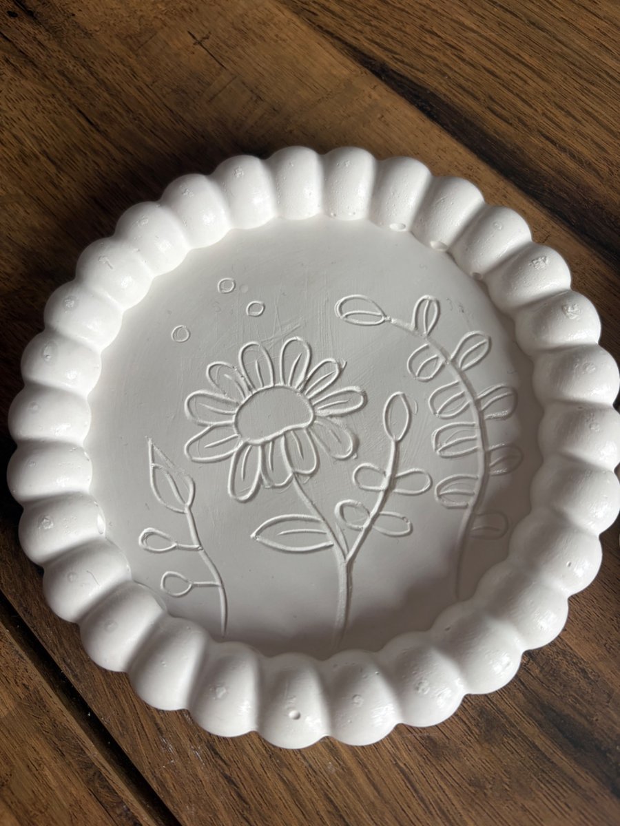 Hand carved floral coasters