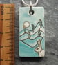 Handmade Ceramic Hare pendant in turquoise blue - Image 3