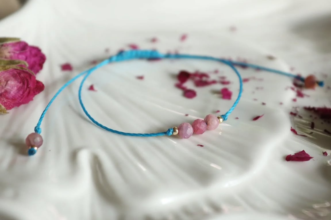 Delicate bracelet with Pink Tourmaline in turquoise colour cord