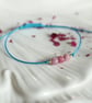Delicate bracelet with Pink Tourmaline in turquoise colour cord - Image 1