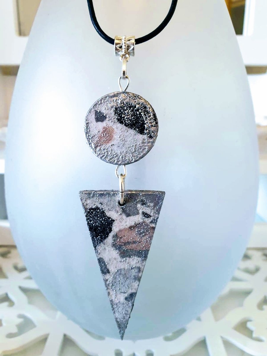 Geometric wood pendant on leather cord