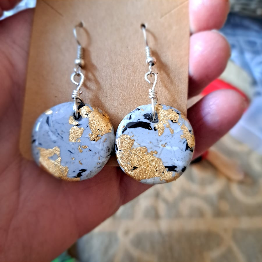 Round pair of grey, black, white, silver and gold marble polymer clay earrings