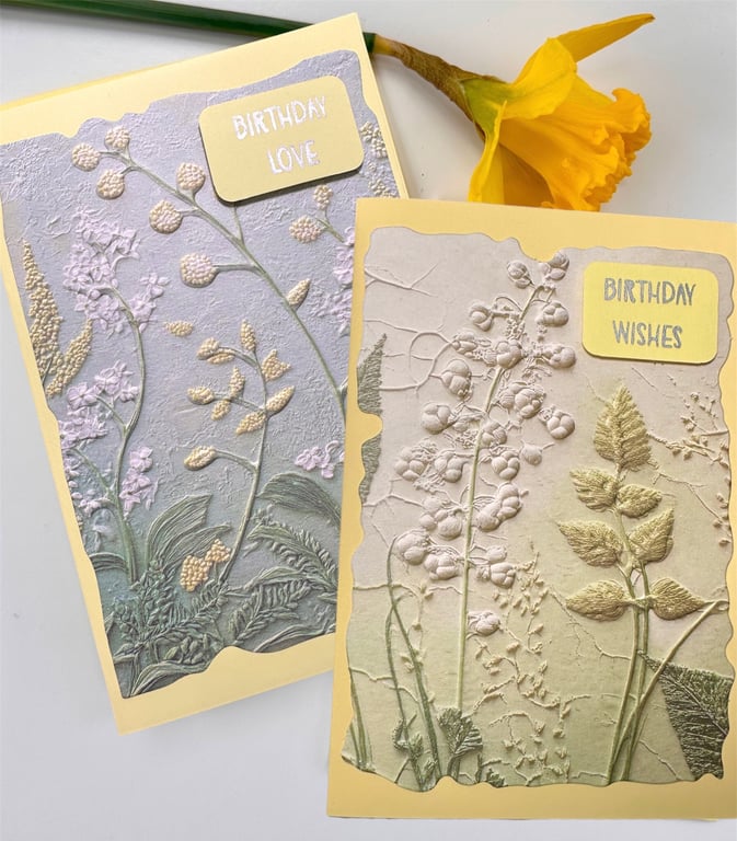 Birthday cards, wishes, love, yellow floral embossed card, blossom and foliage. 