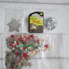 25g of Assorted Star Sequins in Red, Green, Silver & Gold
