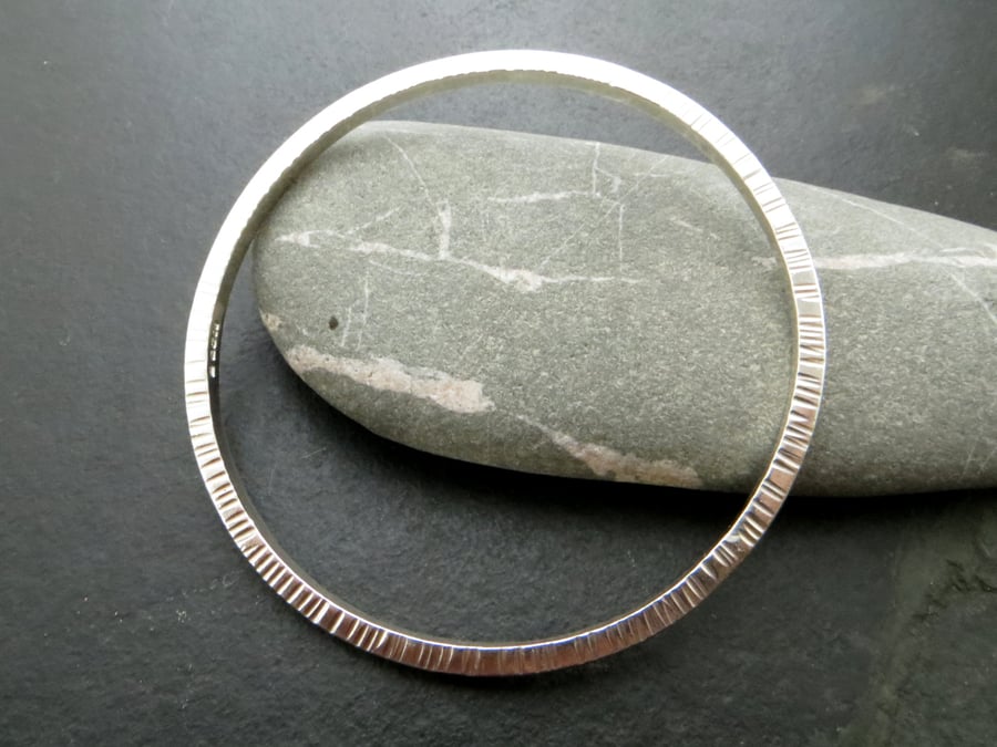 Contemporary square wire bangle with line texture