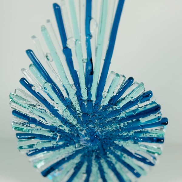 Fused glass ammonite sculpture with candle holder 