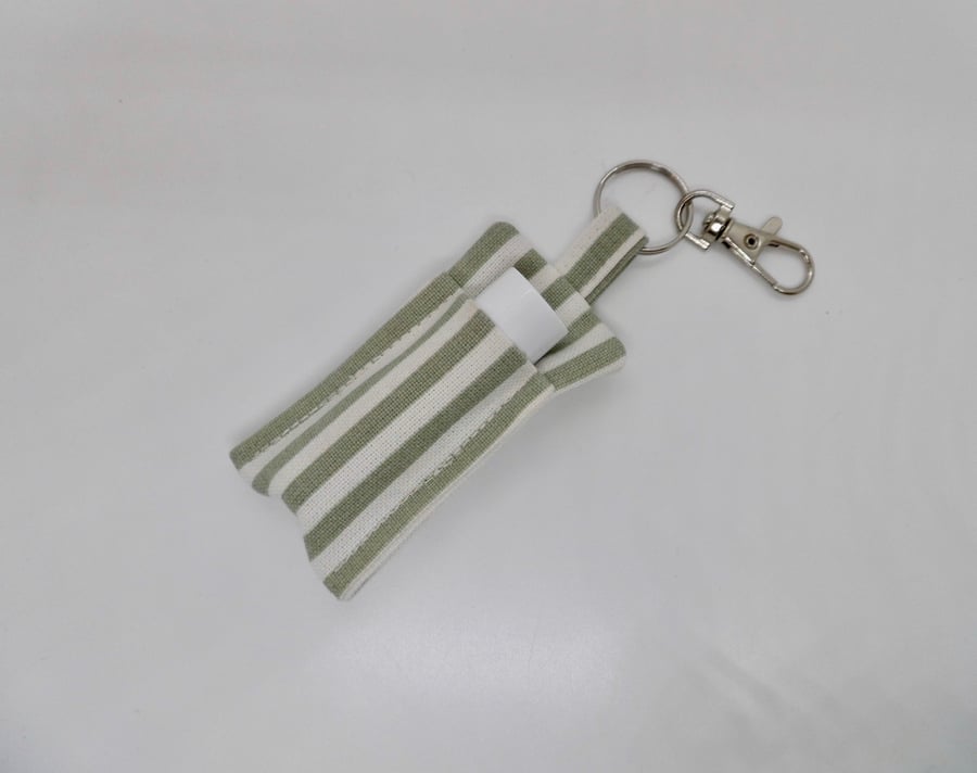 Key ring lip balm holder in green striped fabric