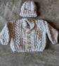 Baby's scarf neck cable cardigan with matching hat 