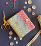 Rainbow patchwork stripe needle case made from Tilda fabric - Image 1