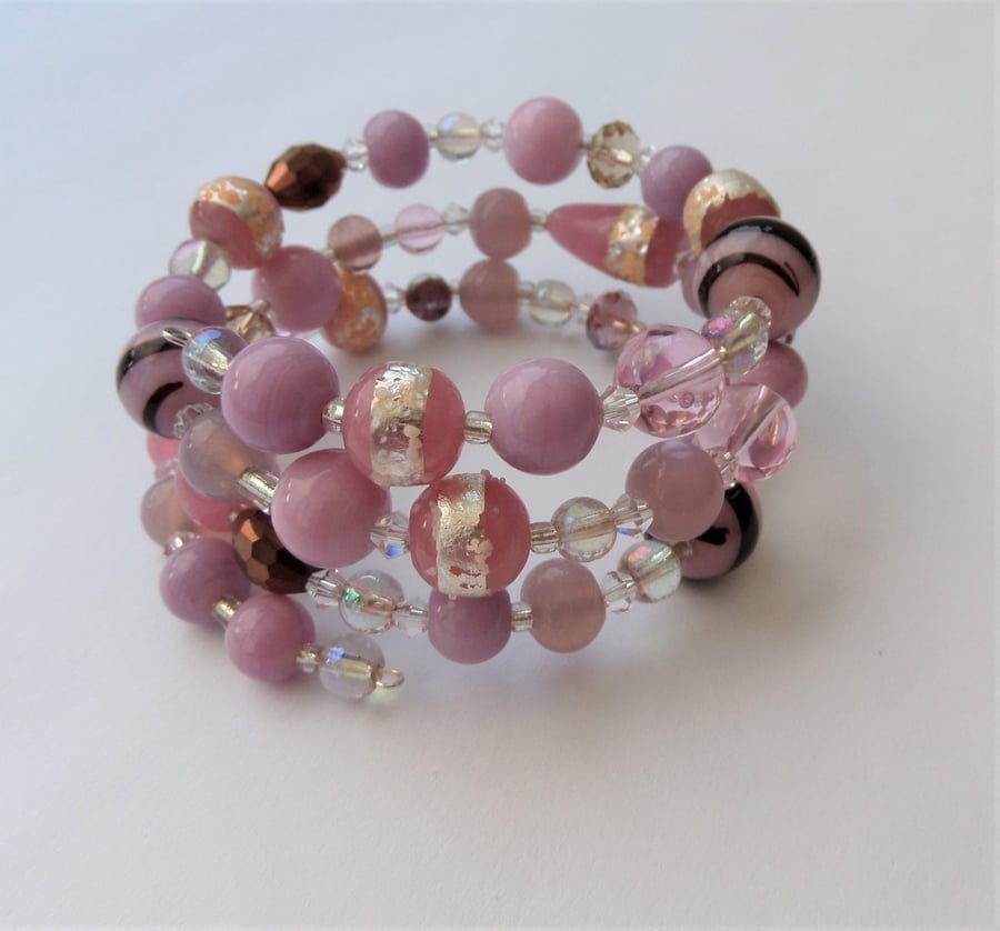 Mixed bead multicoloured memory wire wrap bracelet.