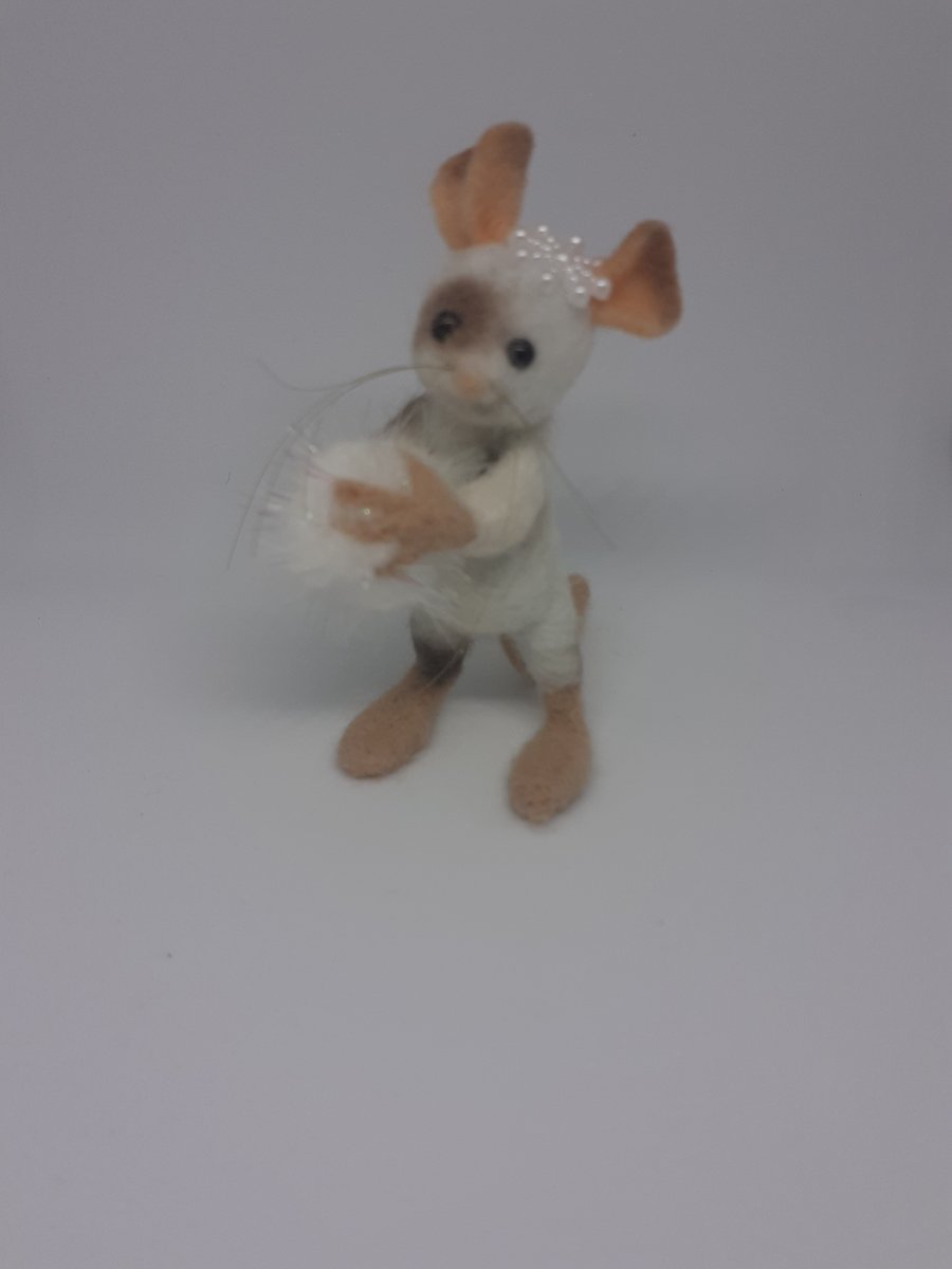 Snowballing needle felted mouse