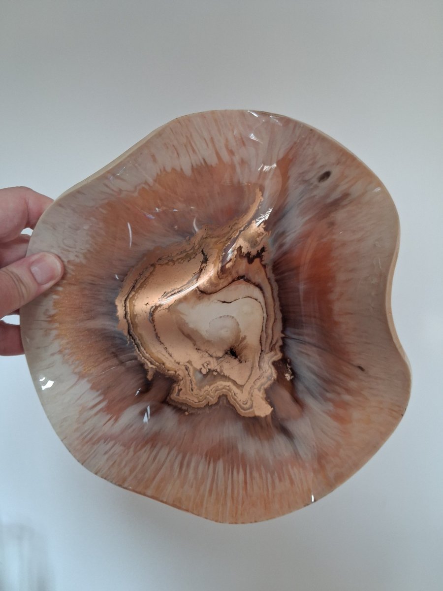 Handmade epoxy resin decorative bowl.
