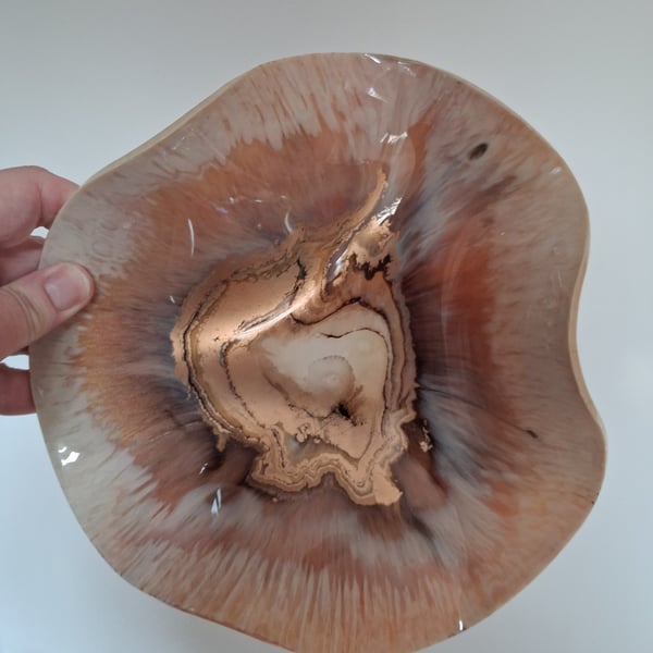 Handmade epoxy resin decorative bowl.
