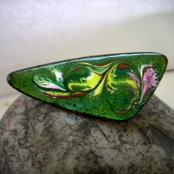 brooch: triangular - scrolled pink, yellow, brown and white on green enamel