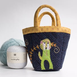 Navy bijou project bag with hand embroidered dog and fern