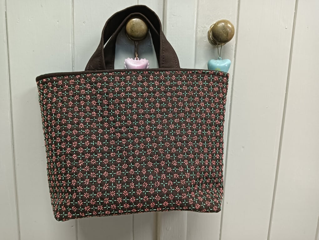Small brown tote bag with sashiko embroidery detail 