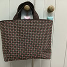 Small brown tote bag with sashiko embroidery detail 