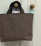 Small brown tote bag with sashiko embroidery detail 