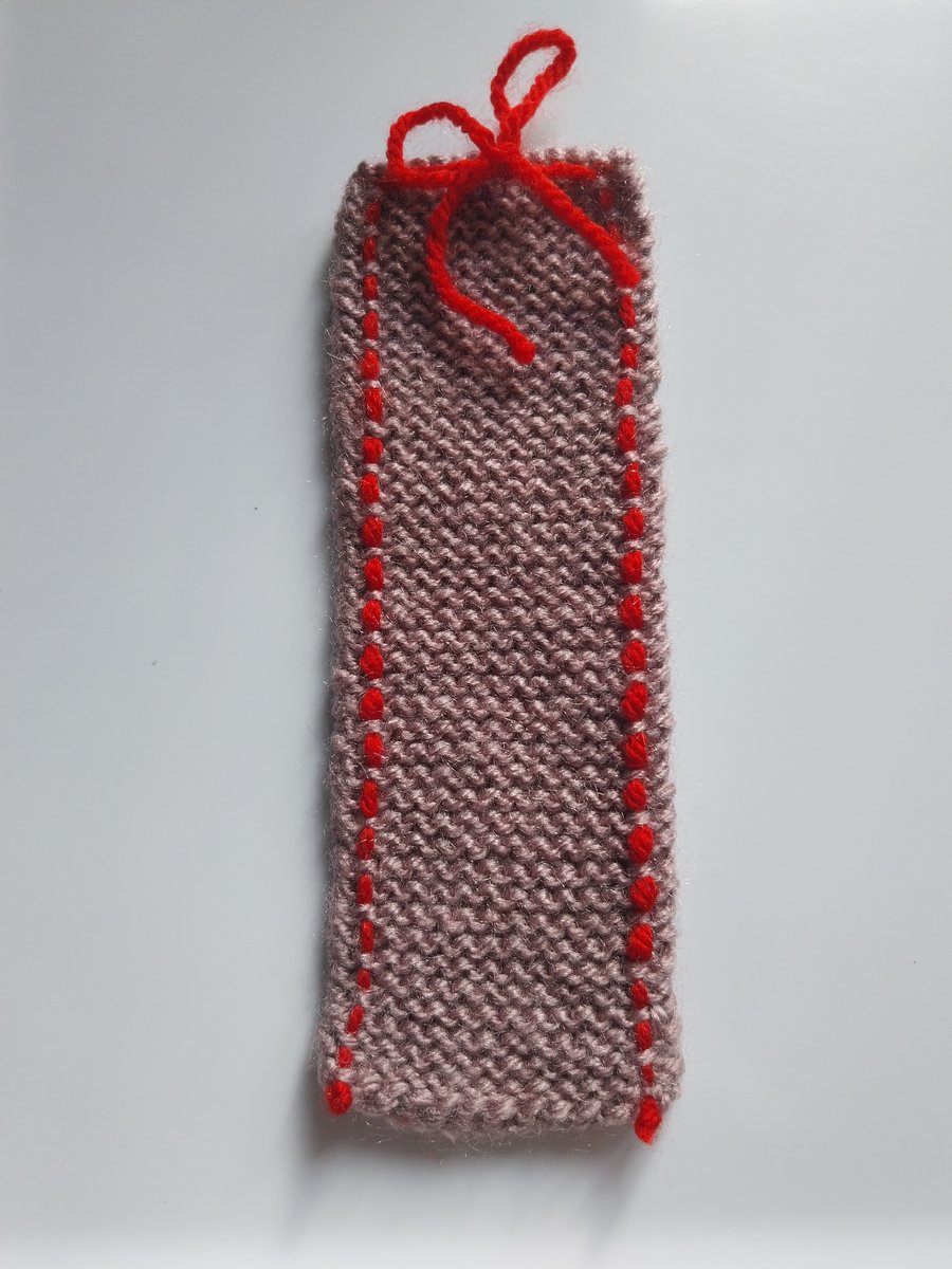 Hand knitted bookmark