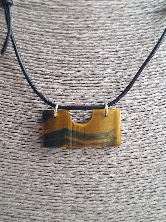 Tiger eye pendant on leather cord