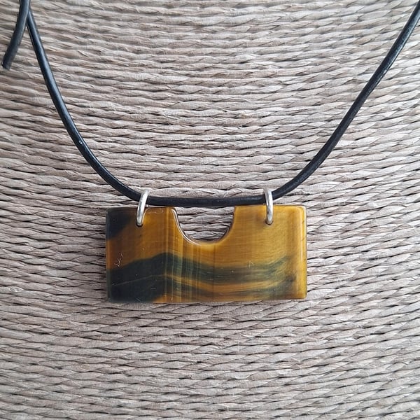 Tiger eye pendant on leather cord