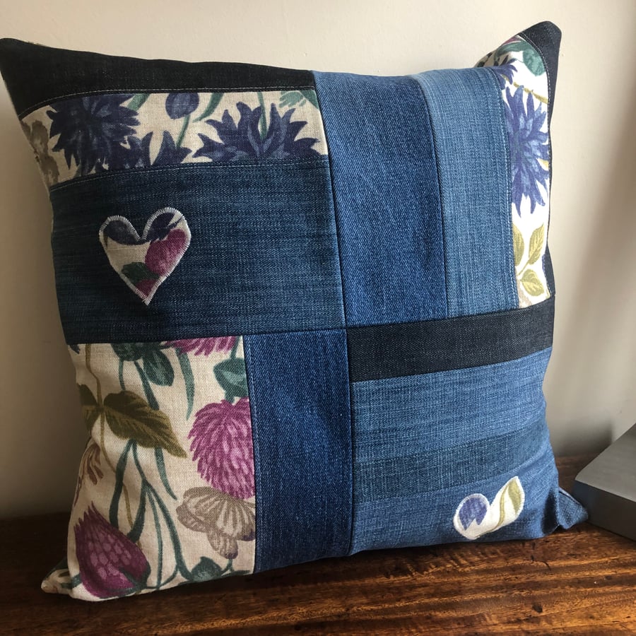 Patchwork denim and floral cushion