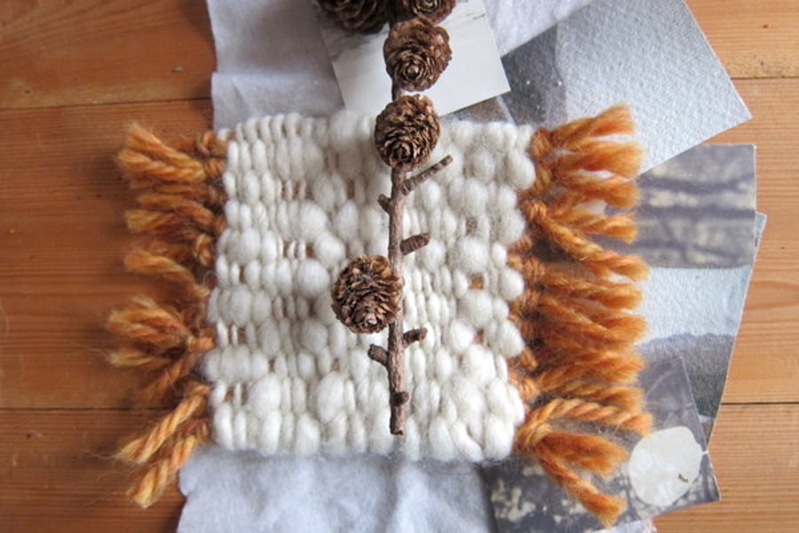 Chunky handwoven coaster made with white wool 