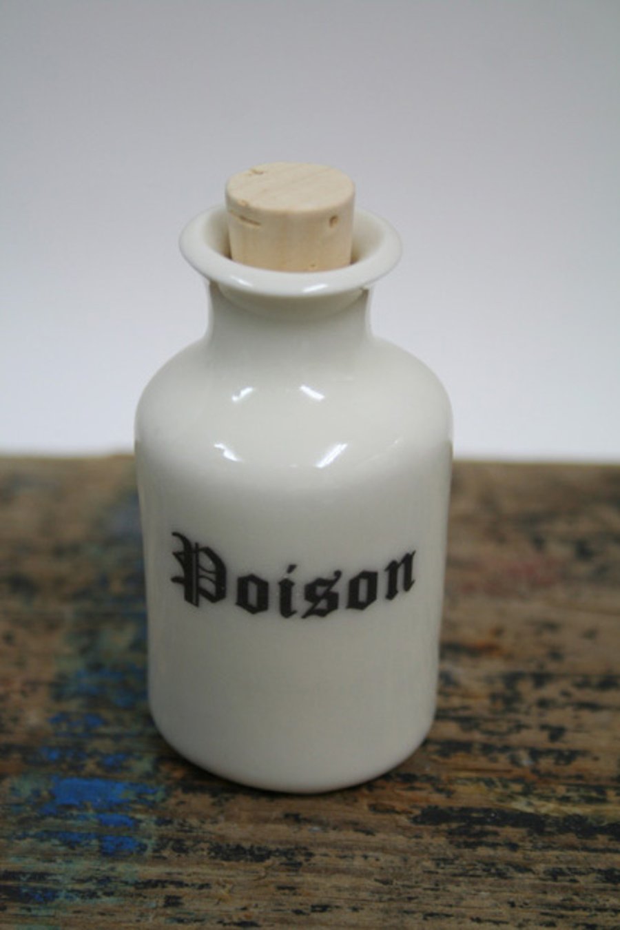 Small porcelain bottle with poison wording