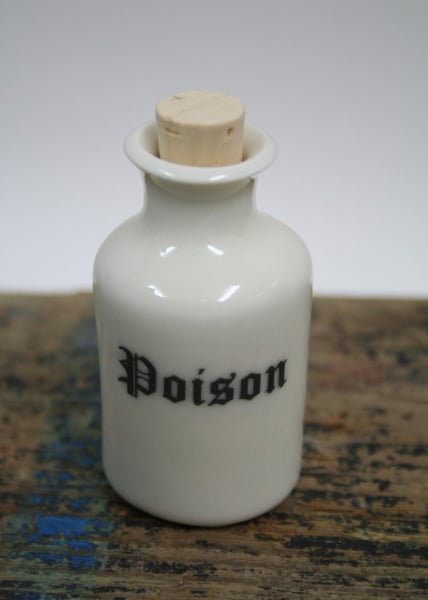 Small porcelain bottle with poison wording