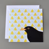 Blackbird on patterned background blank card