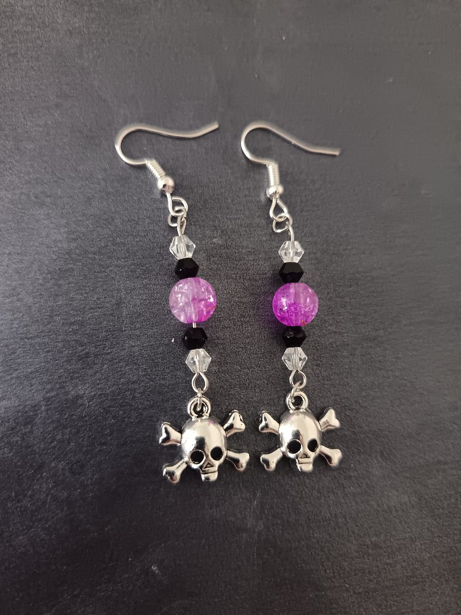 Beaded skull and crossbones charm dangle earrings 