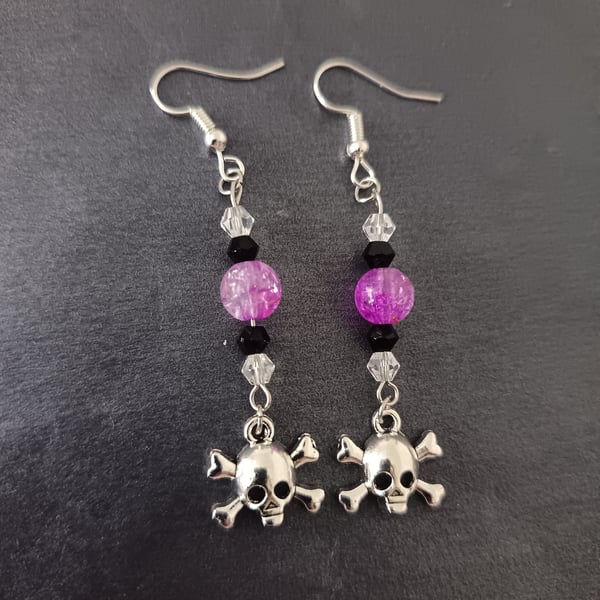 Beaded skull and crossbones charm dangle earrings 
