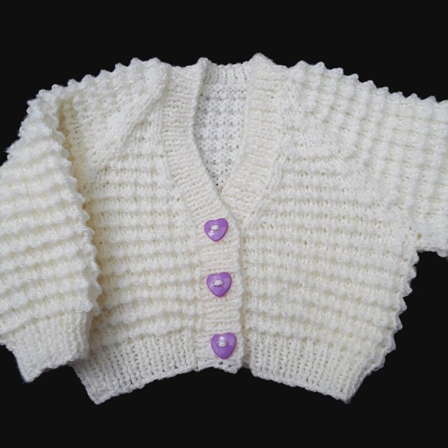 Hand knitted baby cardigan in cream with textured pattern Seconds Sunday