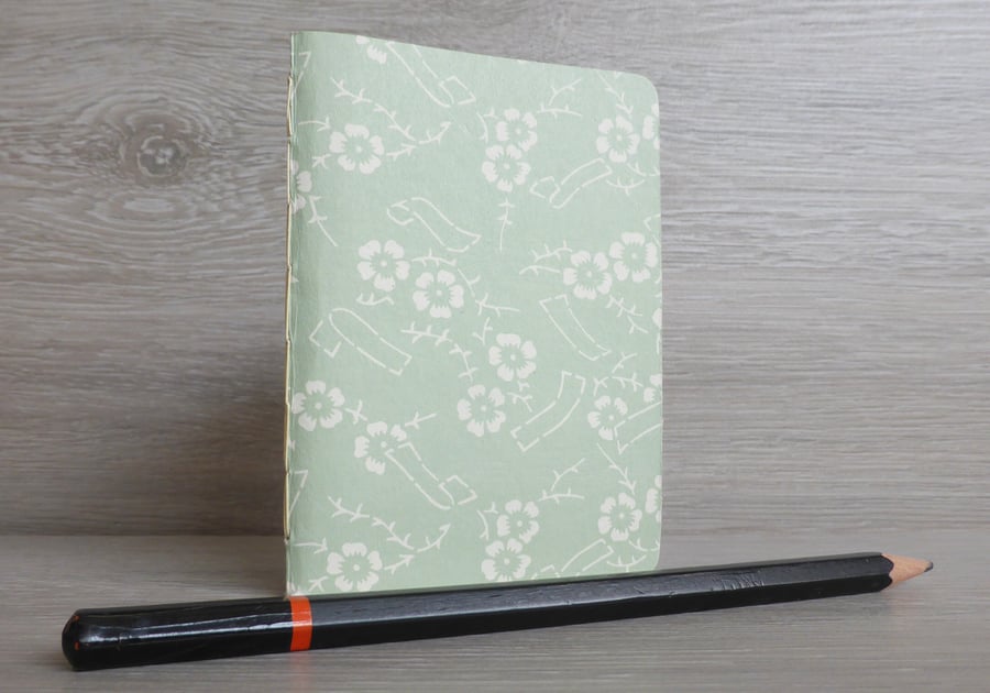 Small hand bound A7 notebook or sketchbook with green Japanese patterned cover