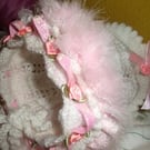 hand knitted frilled baby girl hat