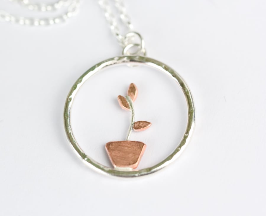 Silver and copper plant pot necklace 