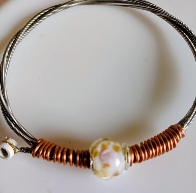 Up-Cycled and Re-Purposed Guitar String Bangle. Groovy !