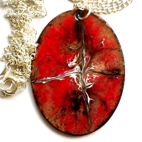 oval pendant  - black and white scrolled on red