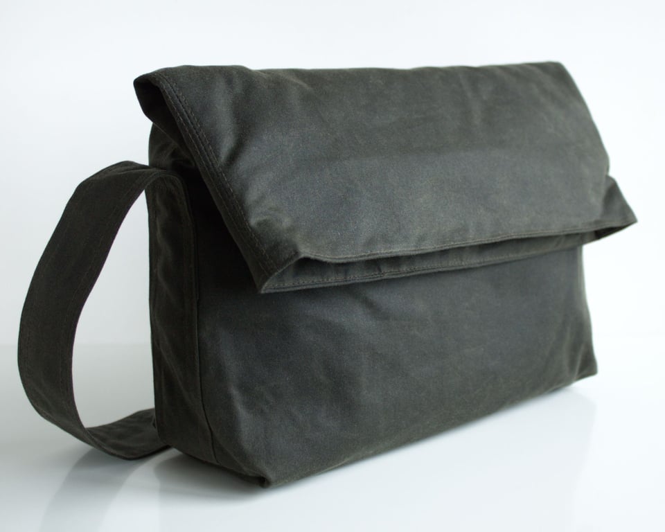 Minimal fold top bag in olive green waxed canvas by Minus