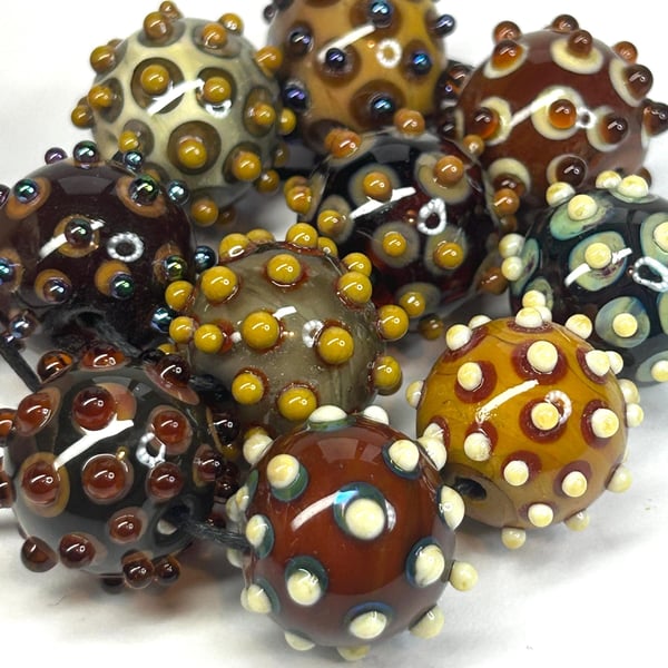 Handmade lamp work glass beads