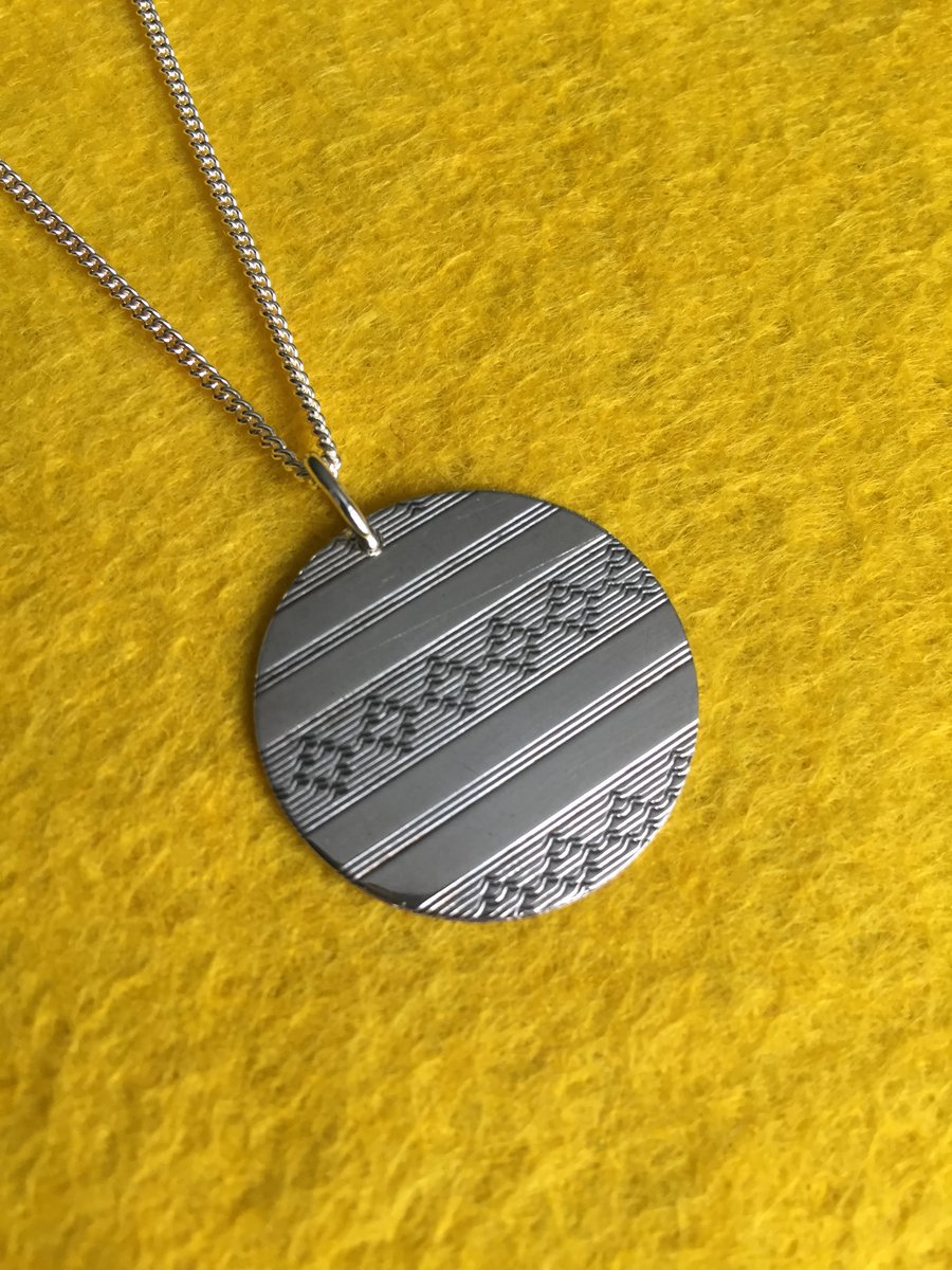 Diamond stripes silver disc necklace 