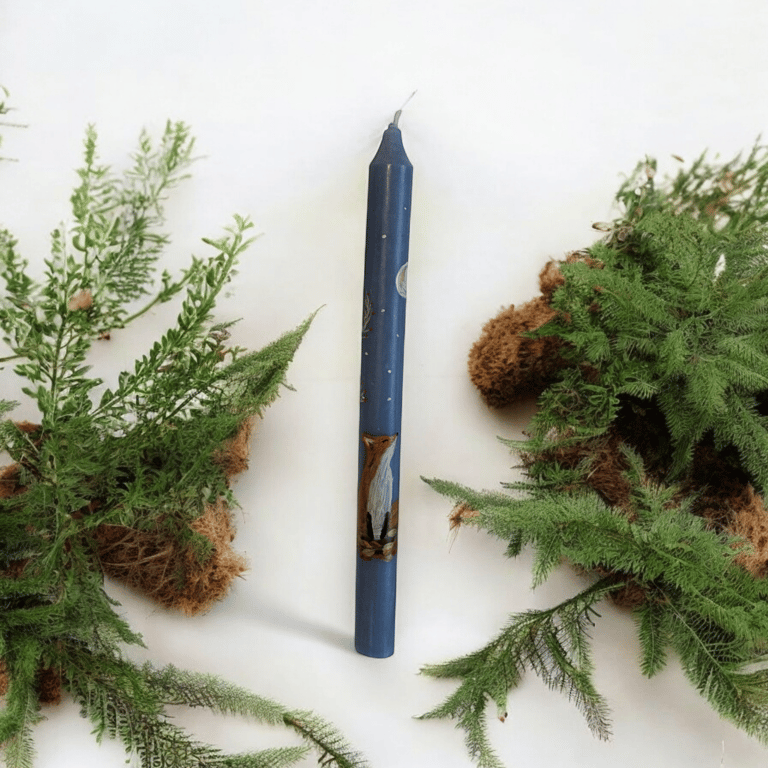 Beautiful fox candle in blue