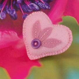 Felt heart shaped brooch with hand embroidery